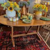 Oval French wine tasting table, made stationary, two drawers